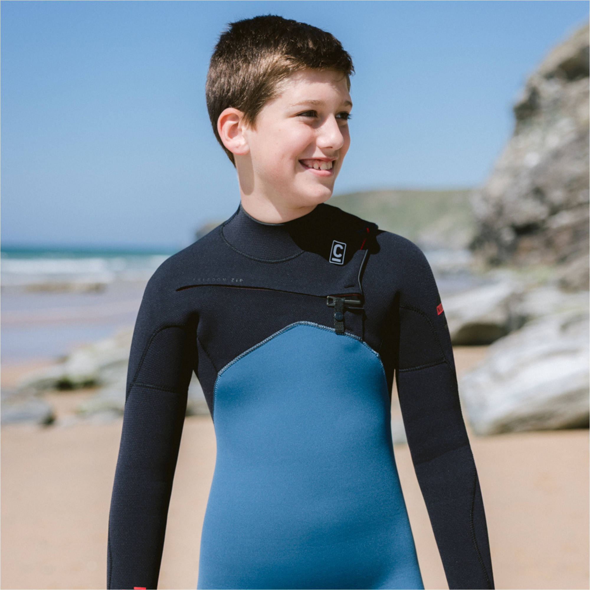 2026 C-Skins Junior Nuwave Session 5/4mm Chest Zip Wetsuit CSE54JC - Legion Blue / Black / Red